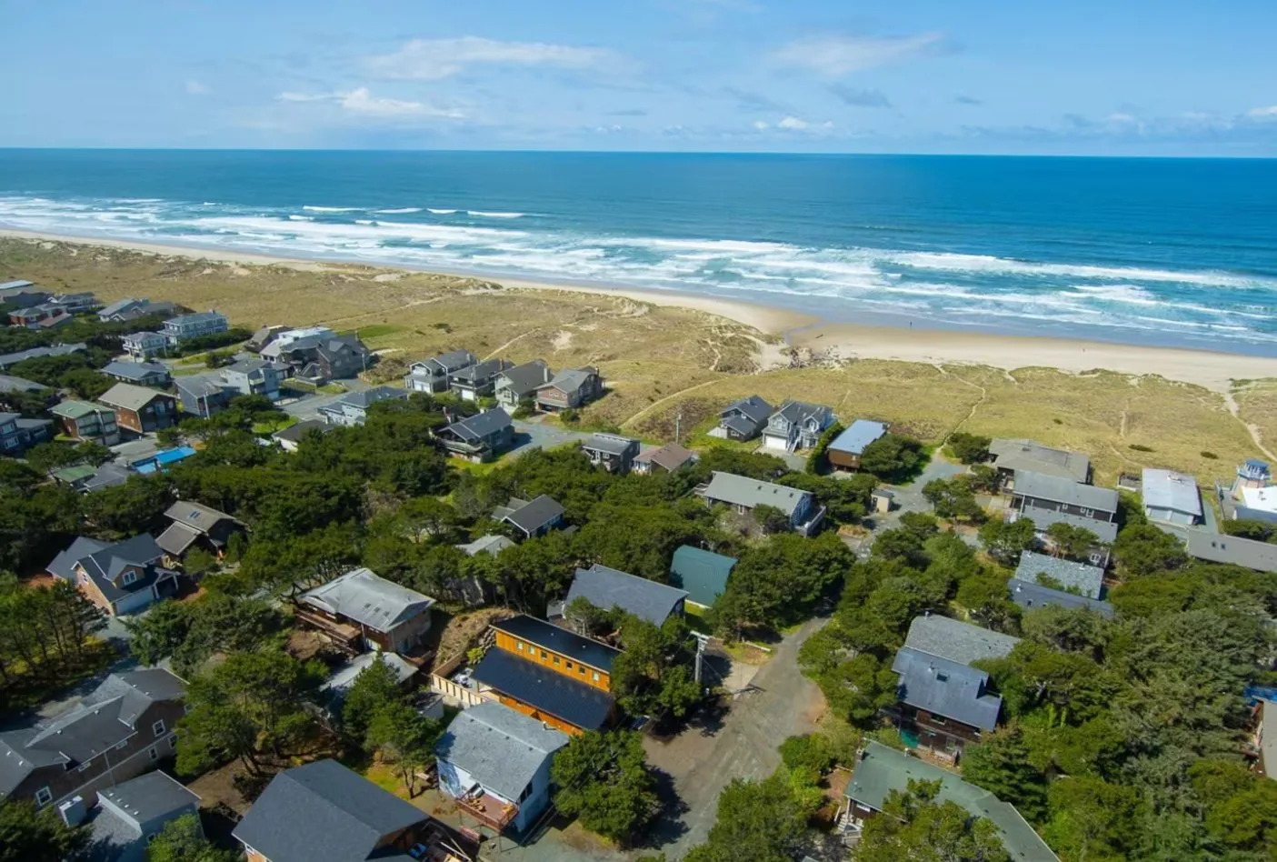 Aerial view showing how close the house is to the beach